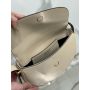 Prada Arqué leather shoulder bag with flap